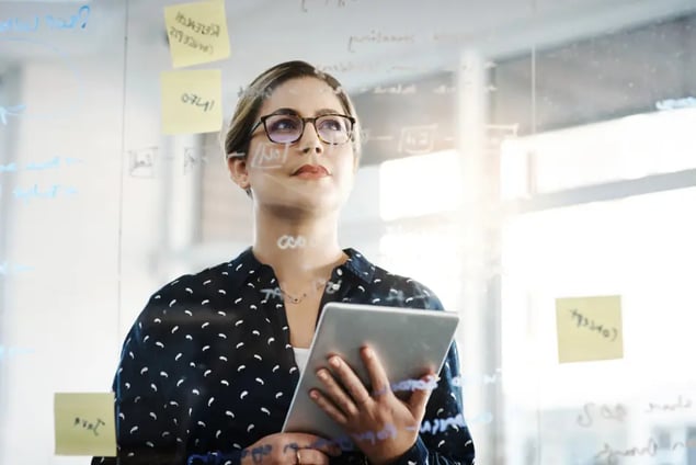 woman in office thinking